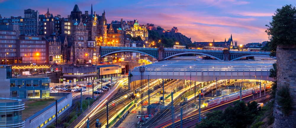 Sunset in Edinburgh over train lines