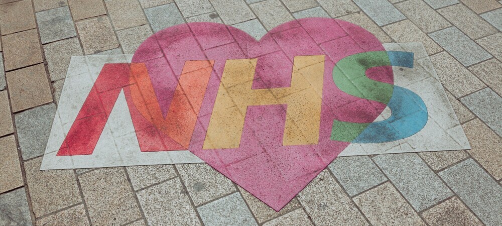 Colourful NHS Lettering on a Heart by Nicolas J Leclercq