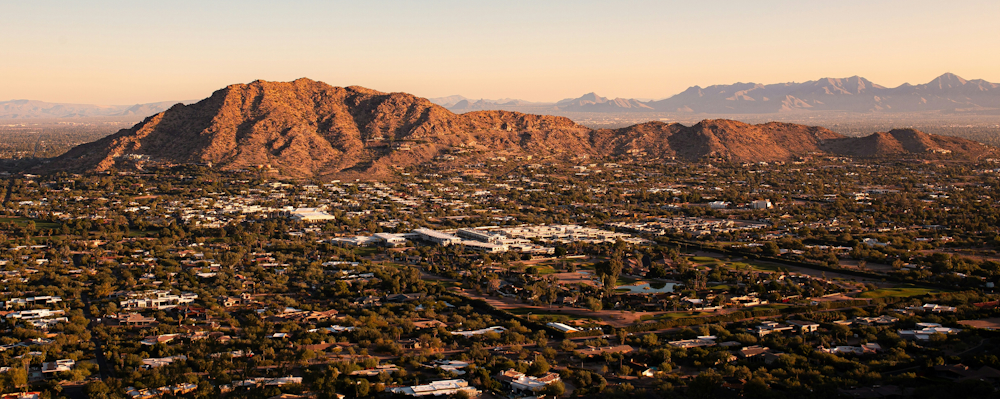 Camelback Mountain Above Residential Neighborhoods at Golden Hour in Phoenix by Rylan Hill on Unsplash