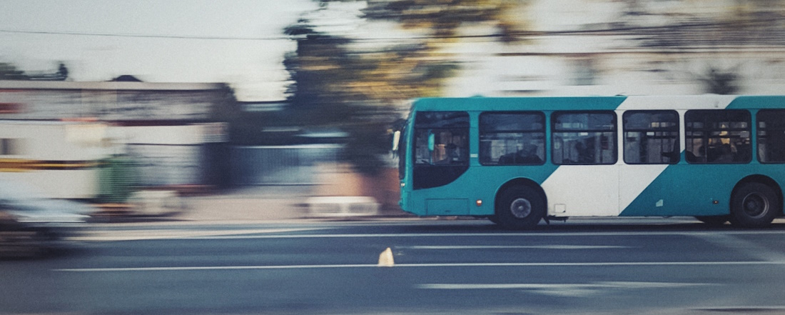 Blue and white bus