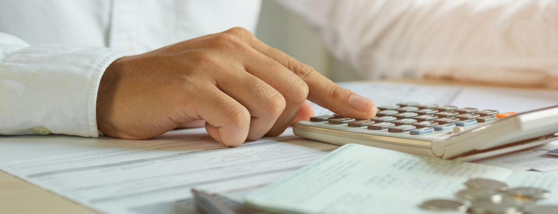 office worker using a calculator