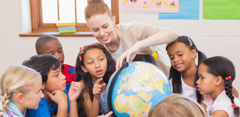 students and teacher in a geography class